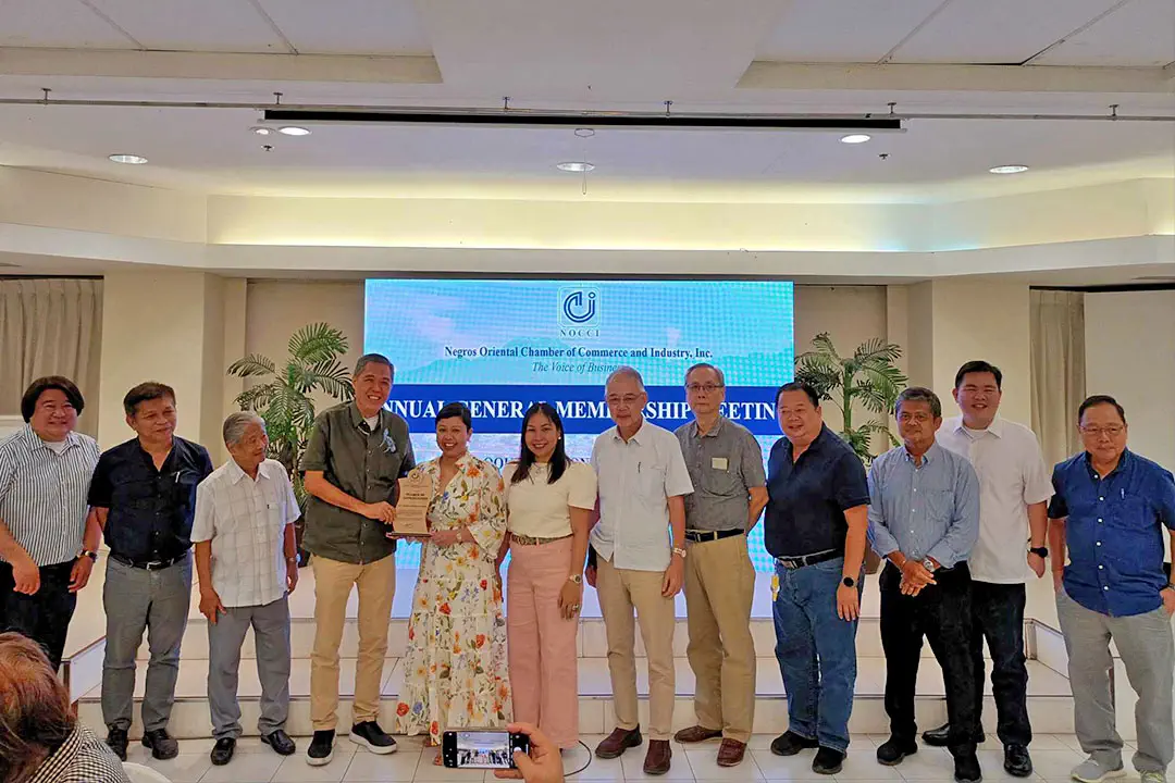 The NOCCI Board of Trustees and Officers posed with Atty. Myrish Cadapan-Antonio as she received the Plaque of Appreciation